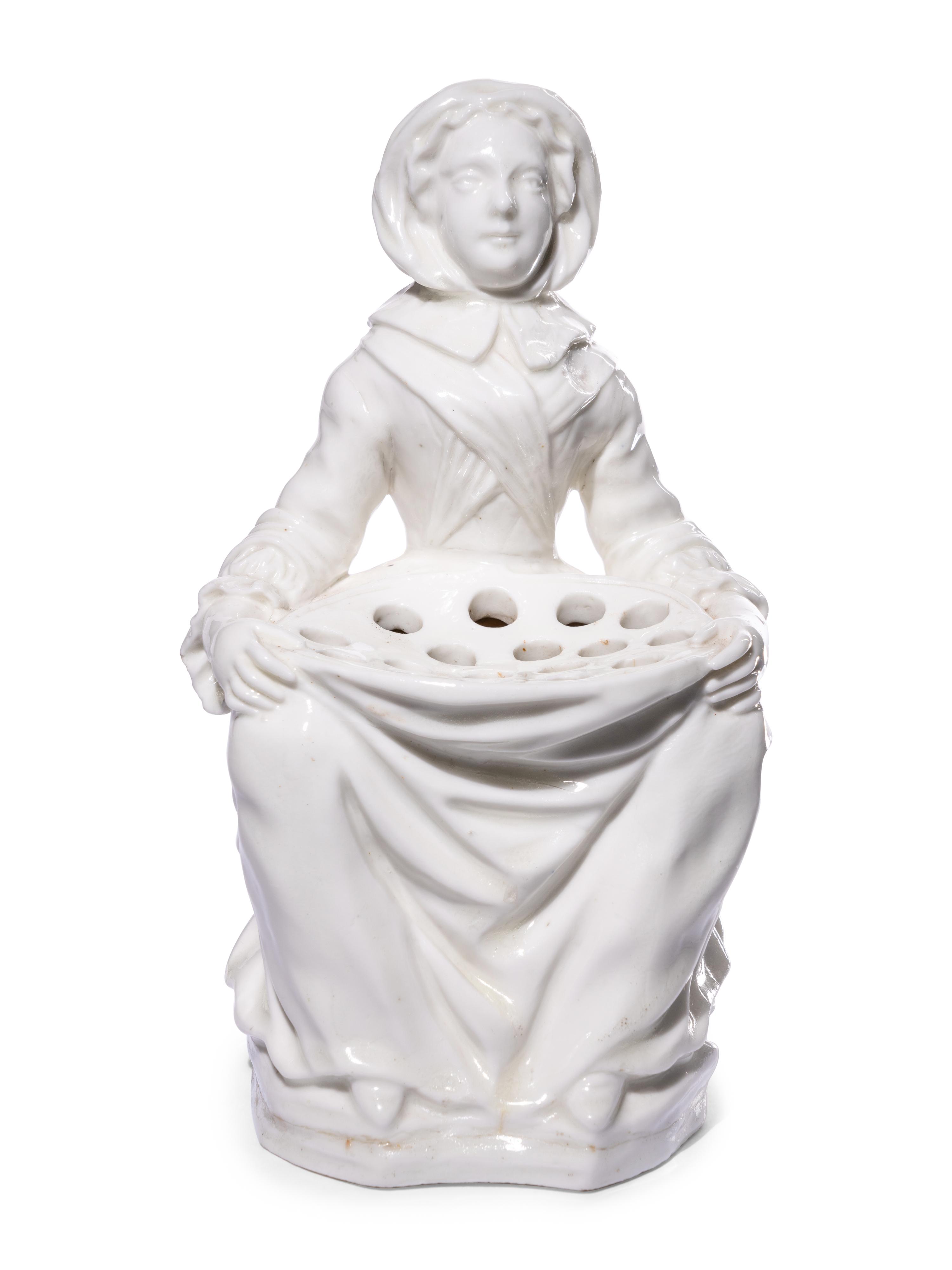 A Pair of French Soft-Paste Porcelain White Bouquetière Figures