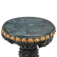 A Pair of Régence Style Patinated and Parcel Gilt Bronze Pedestals