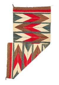A Group of Navajo Weavings and Rugs