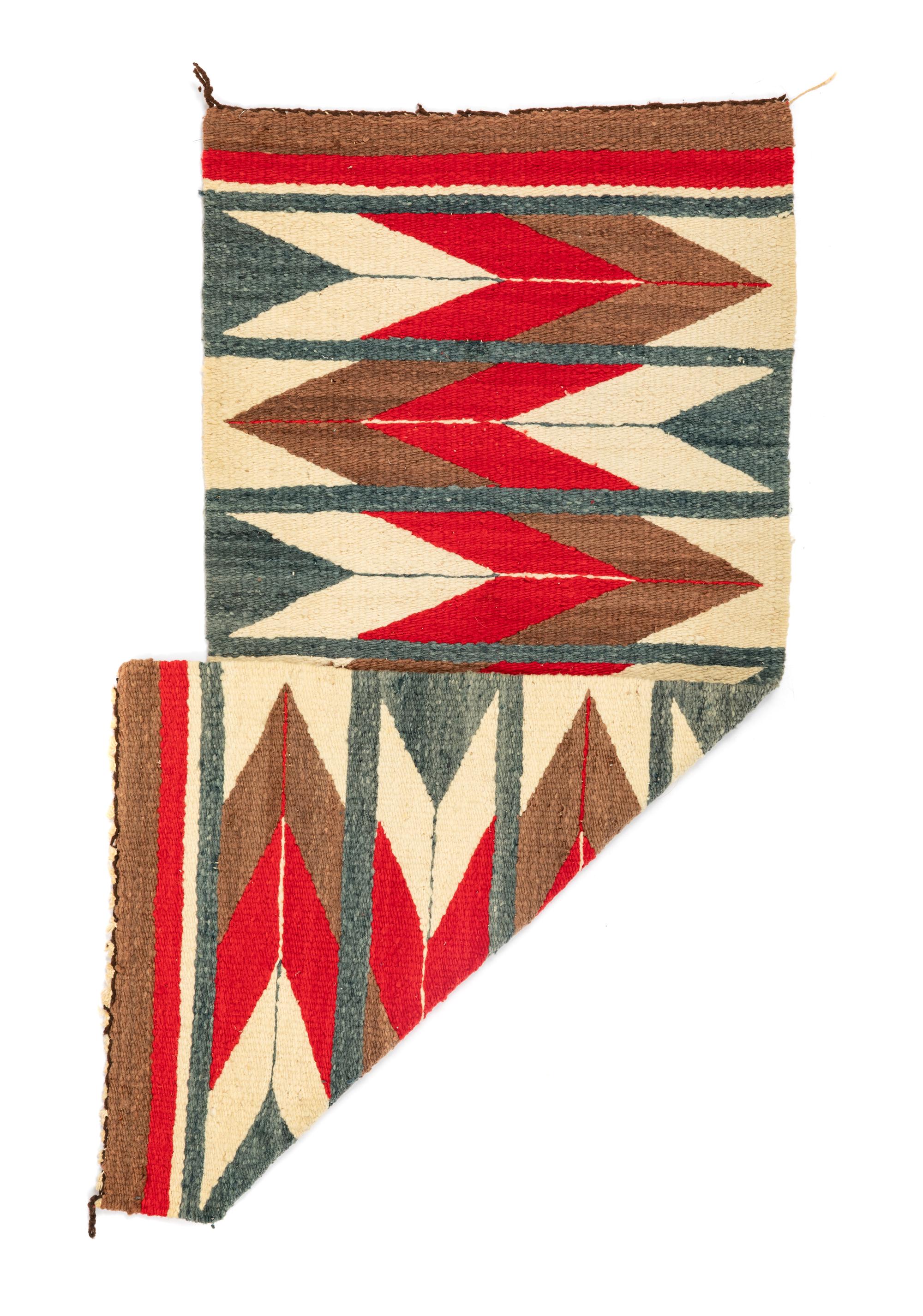 A Group of Navajo Weavings and Rugs