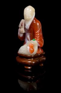 A Chinese Carnelian Agate Figure of Shoulao With Crane 18TH CENTURY Height of agate figure 2 1/2 inches. — 18TH CENTURY