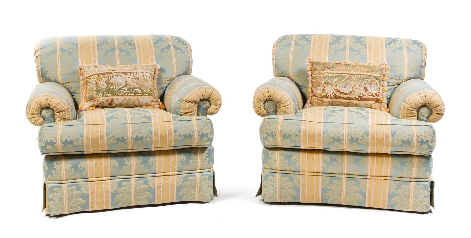 A Pair of Upholstered Armchairs Height 35 x width 39 x depth 36 inches.
