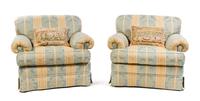 A Pair of Upholstered Armchairs Height 35 x width 39 x depth 36 inches.
