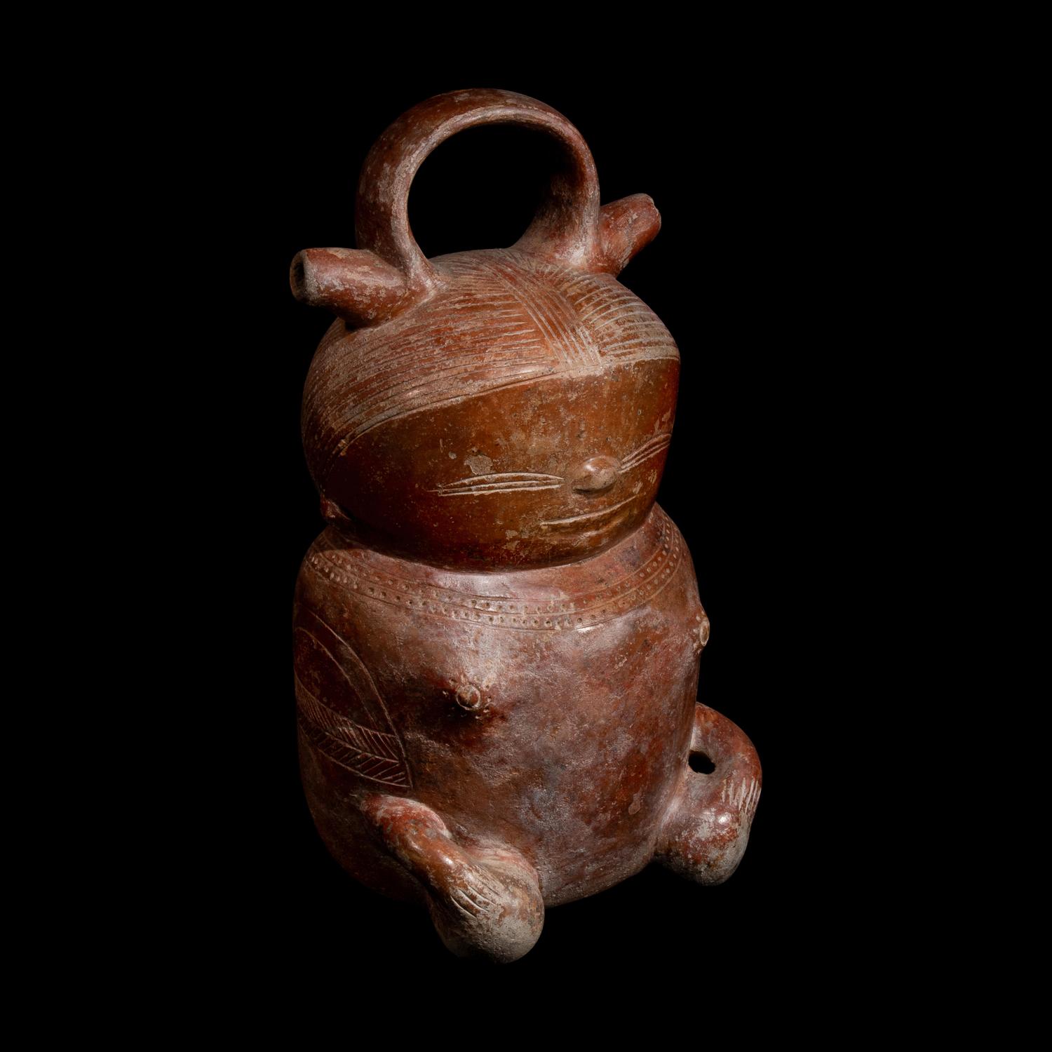 A Calima Redware Anthropomorphic Alcarraza