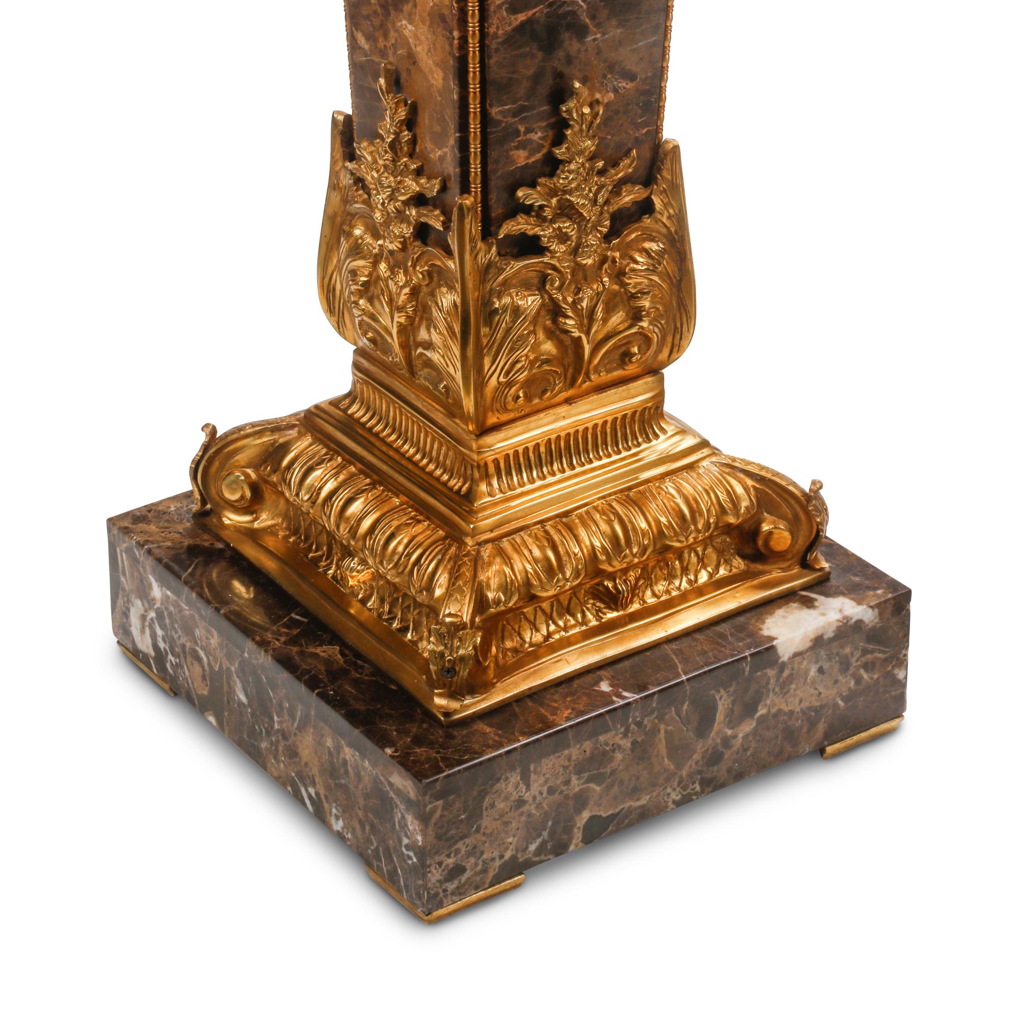 A Pair of Gilt Bronze Mounted Marble Pedestals