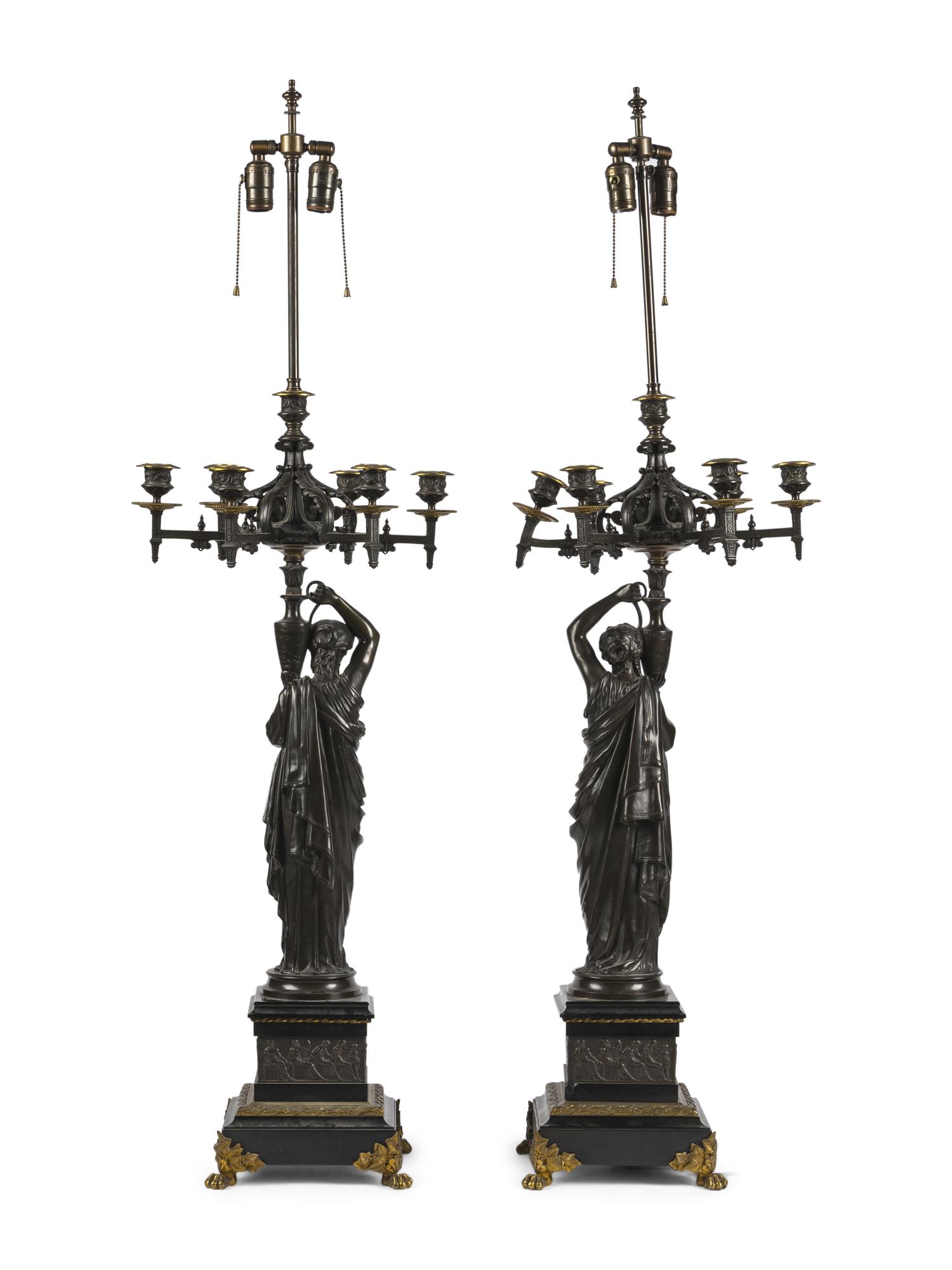 A Pair of Continental Bronze Figural Seven-Light Candelabra Mounted as Lamps