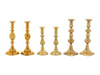 Three Pairs of English Brass Candlesticks