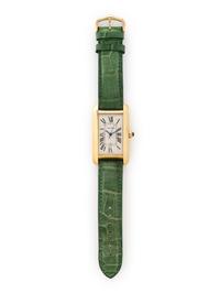 CARTIER, REF. 1740 18K YELLOW GOLD LARGE 'TANK AMÉRICAINE' DATE WATCH WITH CARTIER BUCKLE