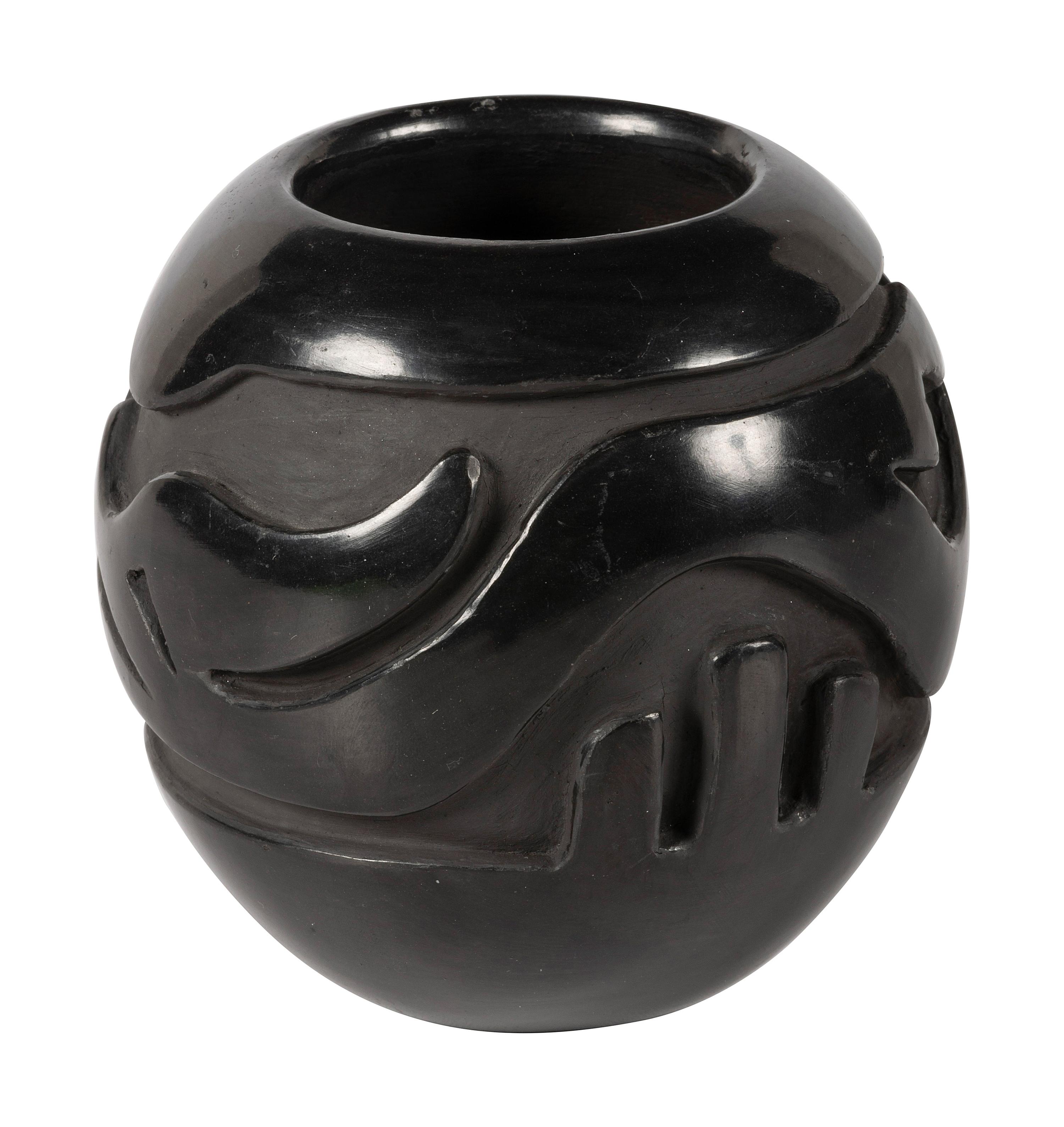 Deeply Carved Blackware Pottery Jar, with Avanyu