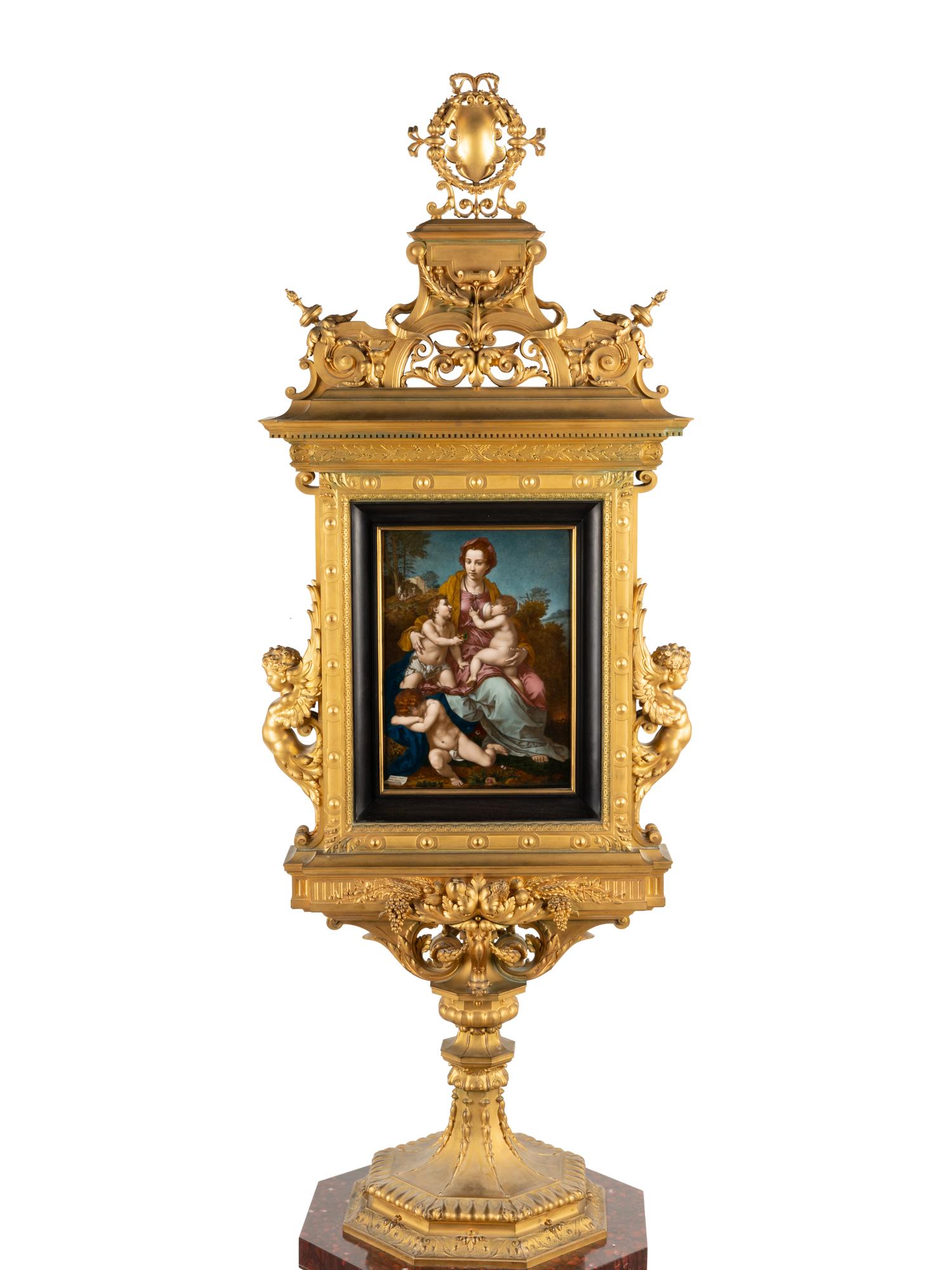 A French Gilt Bronze Double-Sided Tabernacle Encasing Two Enameled Plaques on Marble Pedestal