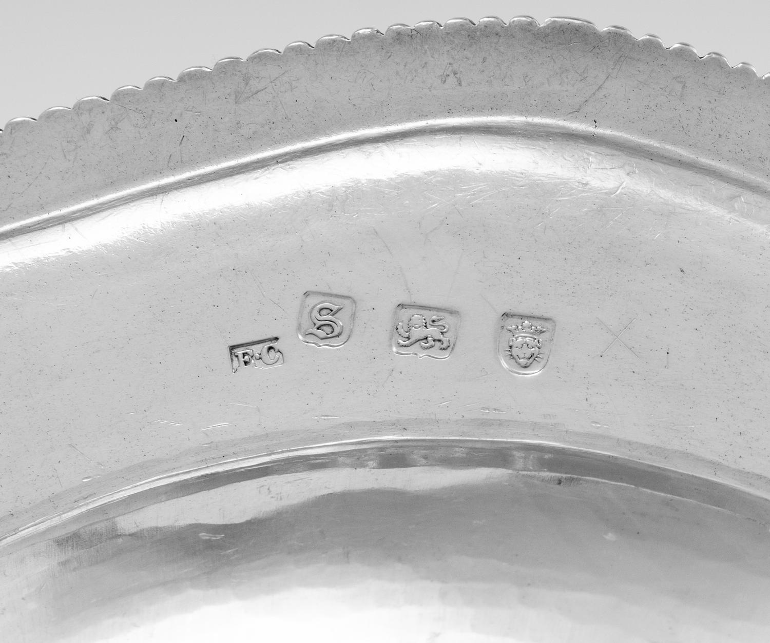 A Set of Four George III Silver Soup Plates
