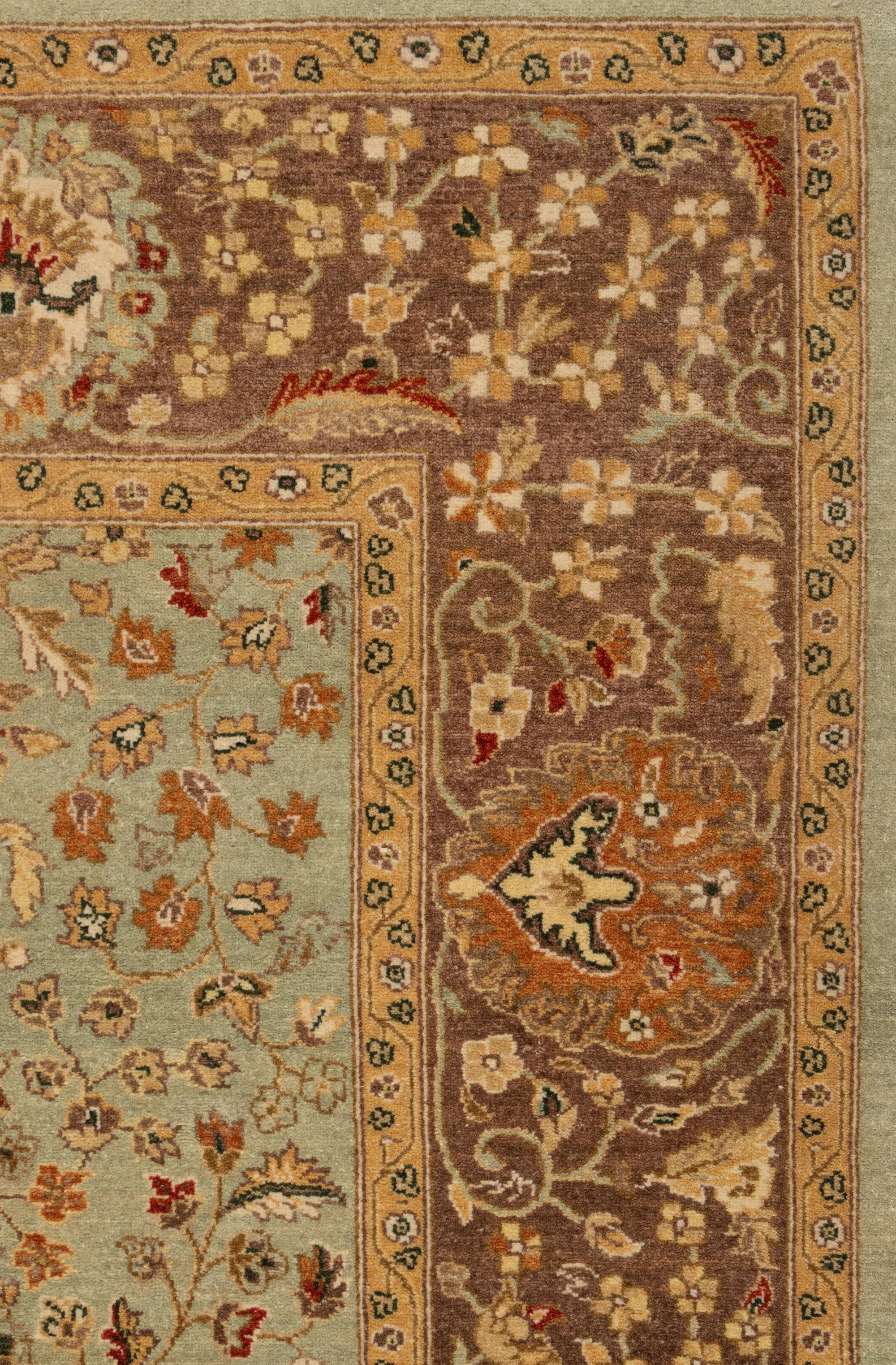 An Agra Design Wool Rug
