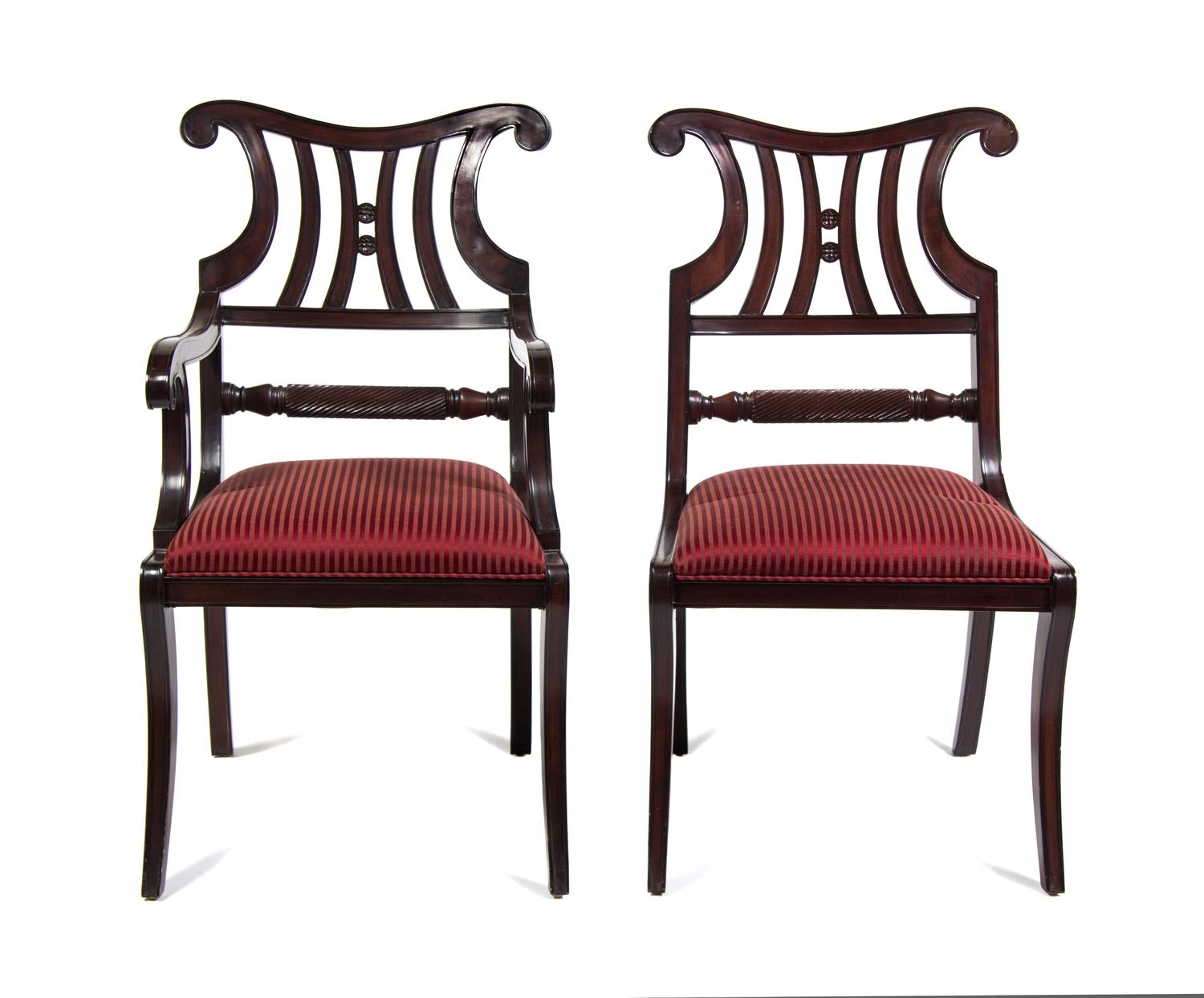 A Set of Fourteen Regency Style Mahogany Dining Chairs Height 38 inches.