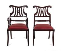 A Set of Fourteen Regency Style Mahogany Dining Chairs Height 38 inches.