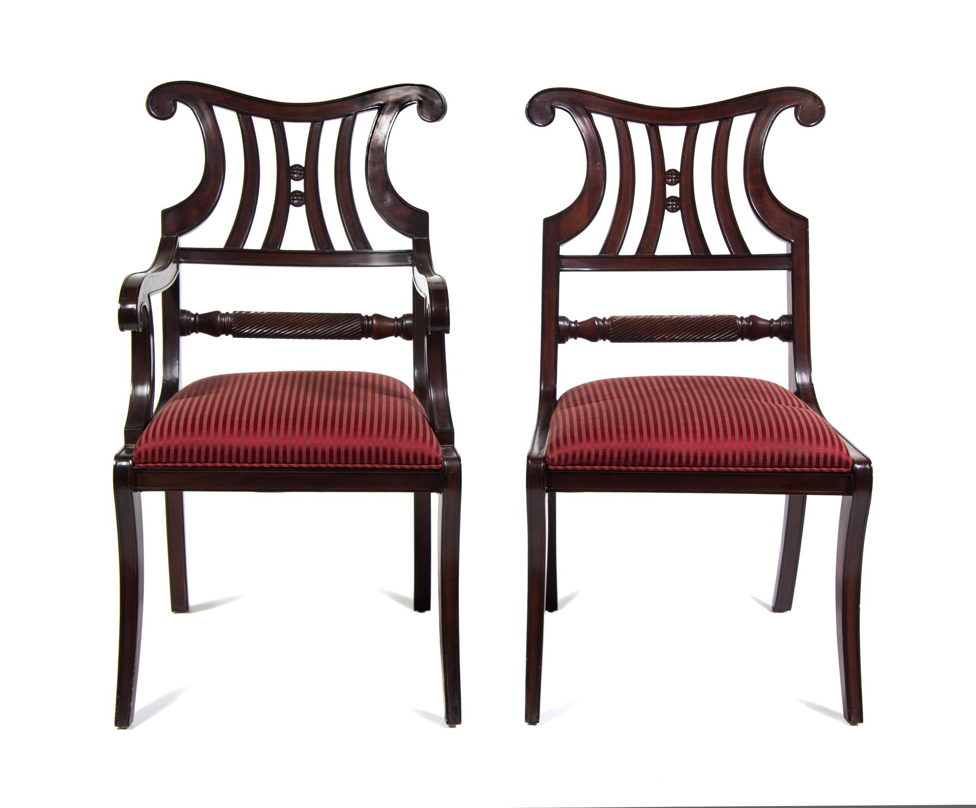 A Set of Fourteen Regency Style Mahogany Dining Chairs Height 38 inches.