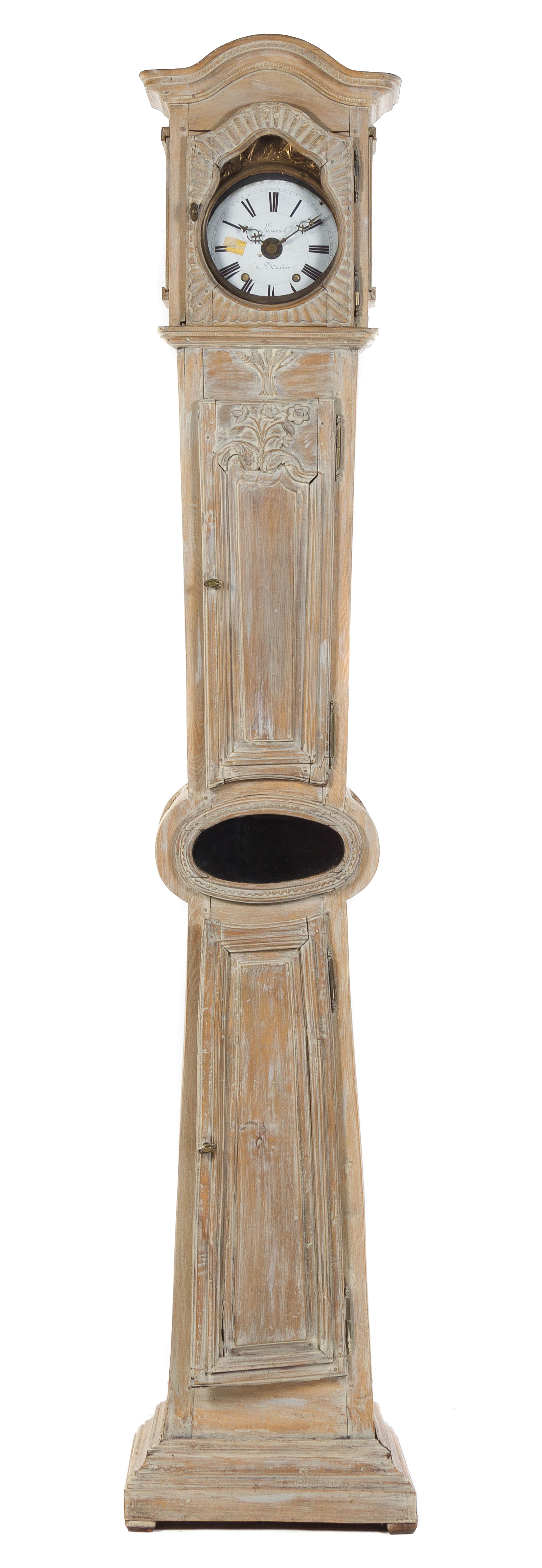 A French Provincial Limed Wood Tall Case Clock Height 94 inches. — 19TH CENTURY