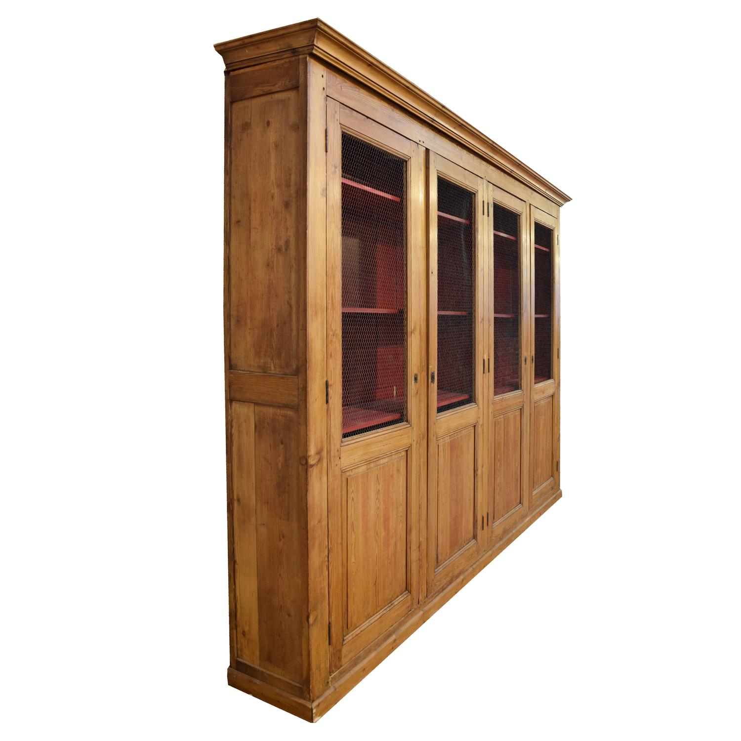 A Pine Four Door Cabinet 129" W x 17.5" D x 93" H — Italy, 19th Century