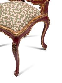 A Set of Six Italian Rococo Red-Painted and Parcel Gilt Dining Chairs