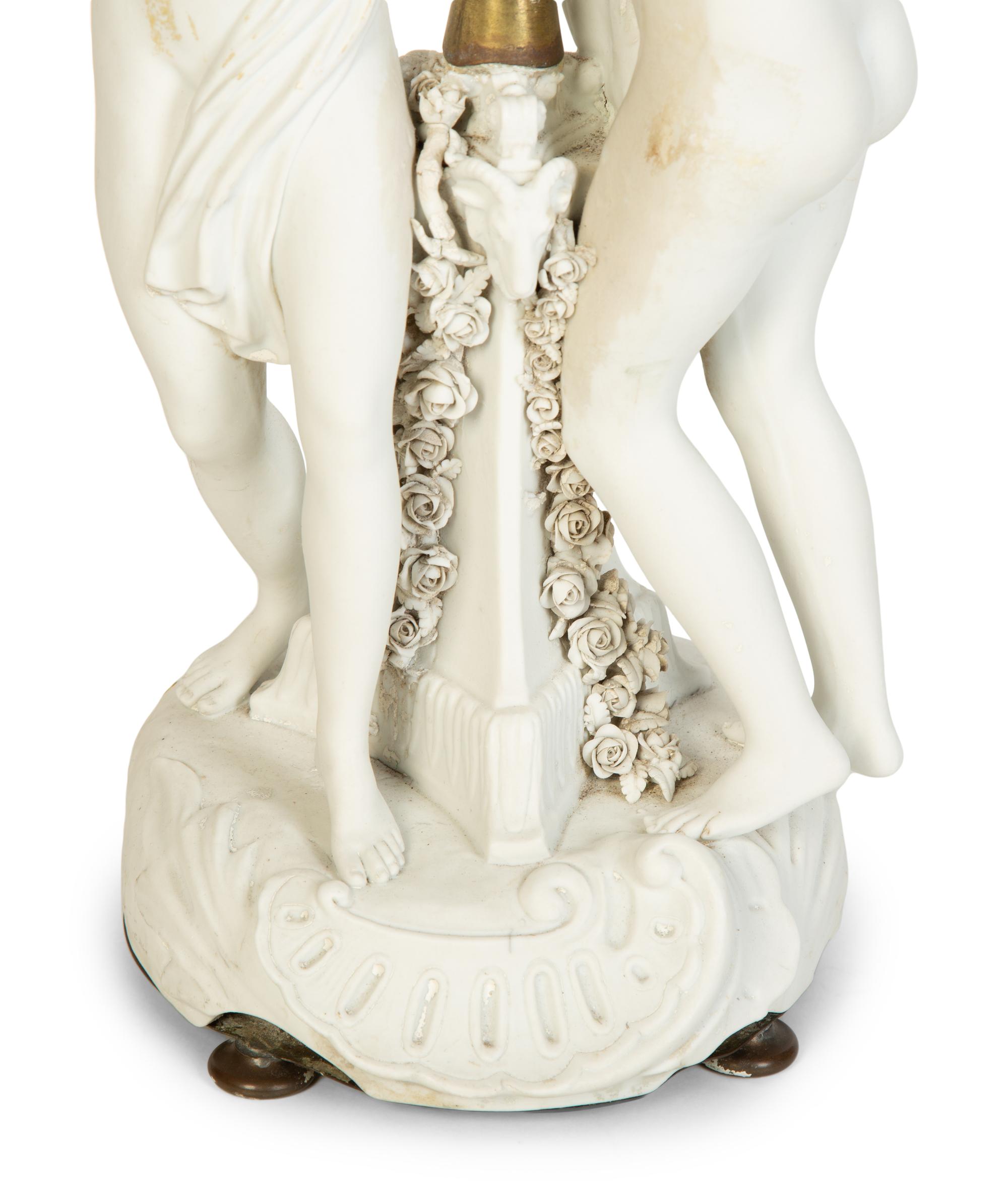A Pair of Venetian Painted and Parcel Gilt Columns with Putti
