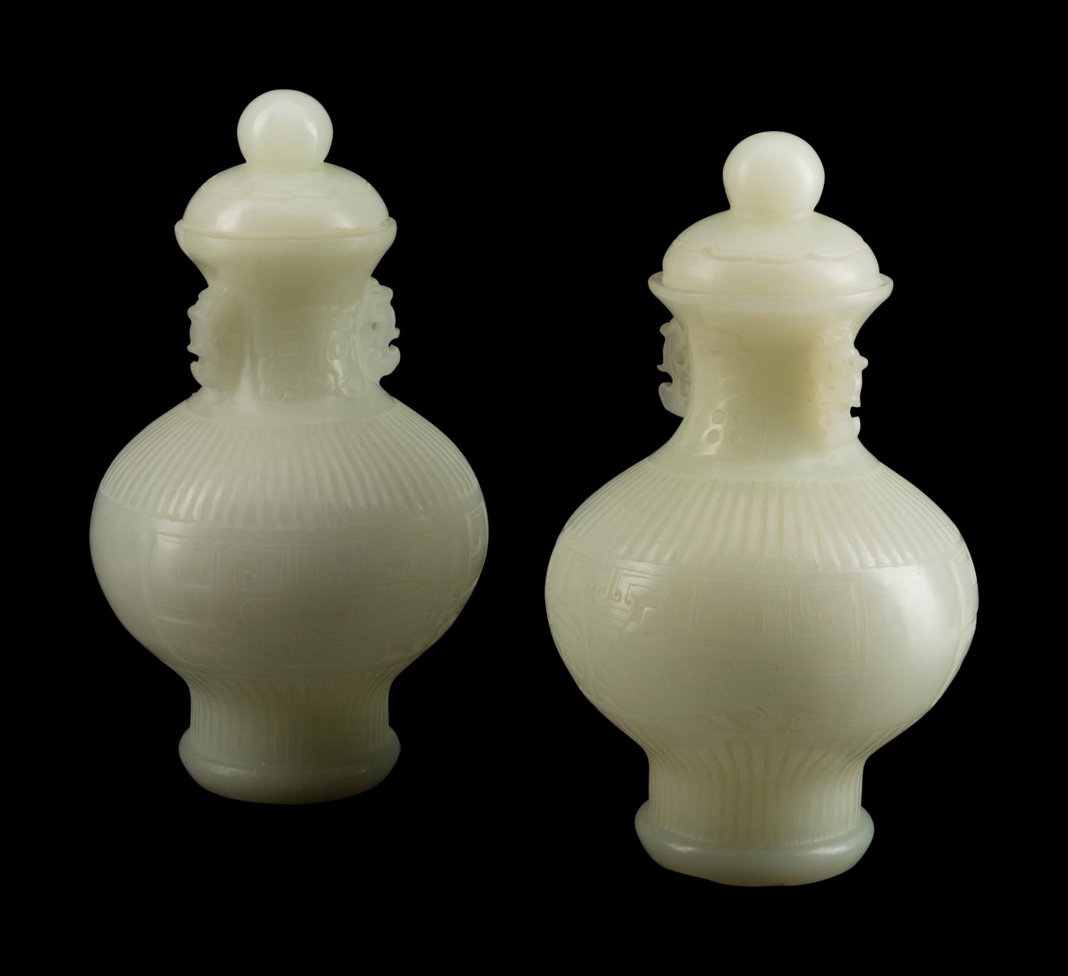 A Pair of Chinese White Peking Glass Covered Vases