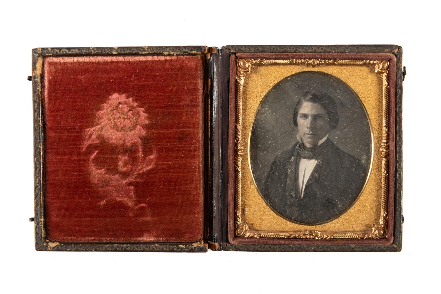 [EARLY PHOTOGRAPHY]. A group of daguerreotype portraits, incl. pendant, possible Hawaiian subject, and case featuring portrait of Daguerre.