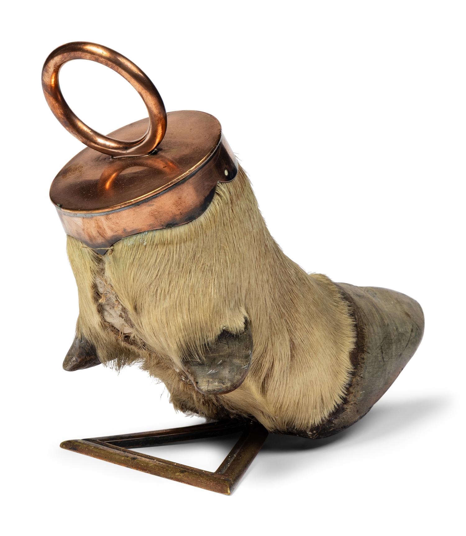 A Taxidermy Elk Hoof Door Stop