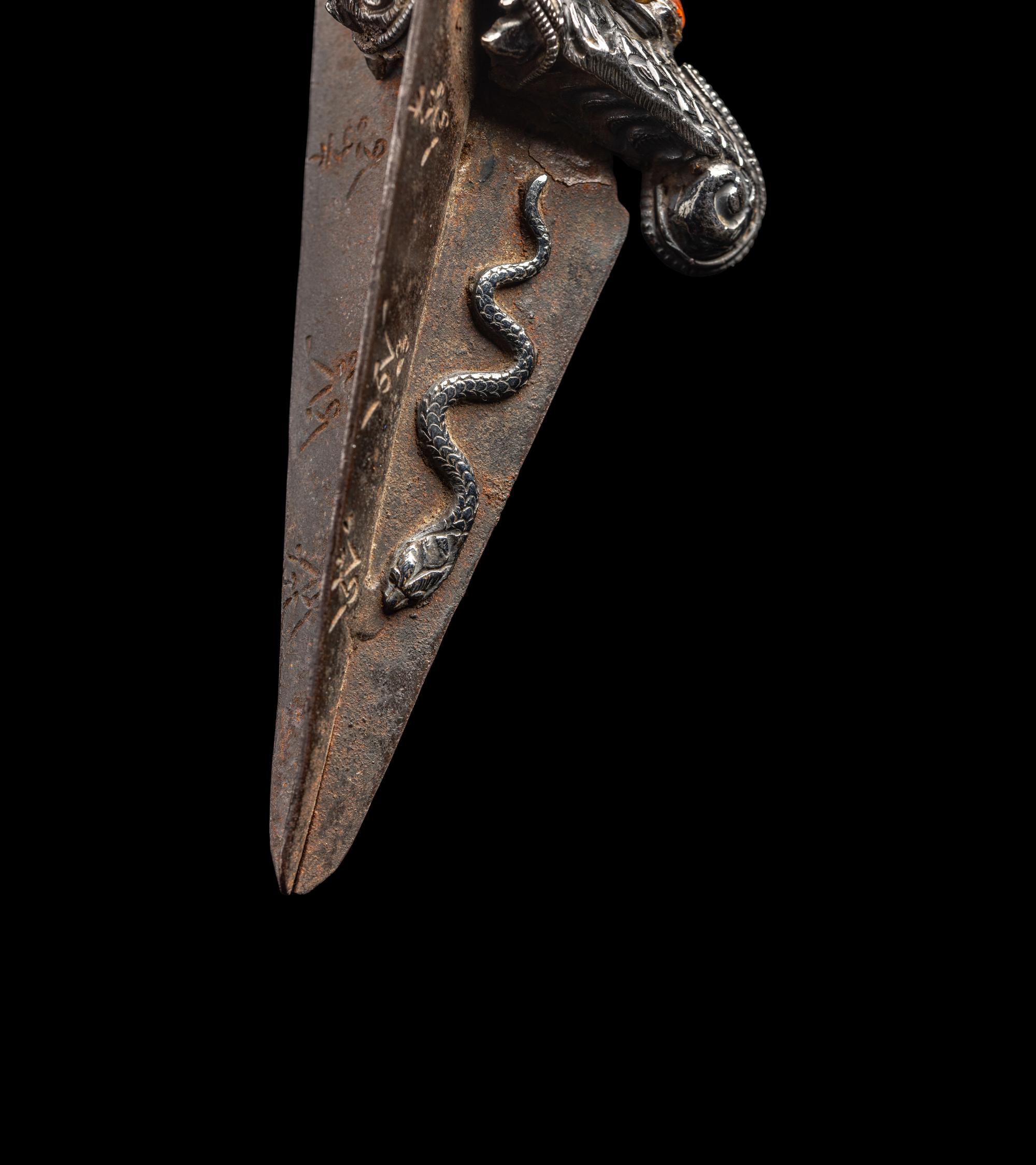 A Tibetan Hardstone Inset Silver Vajra