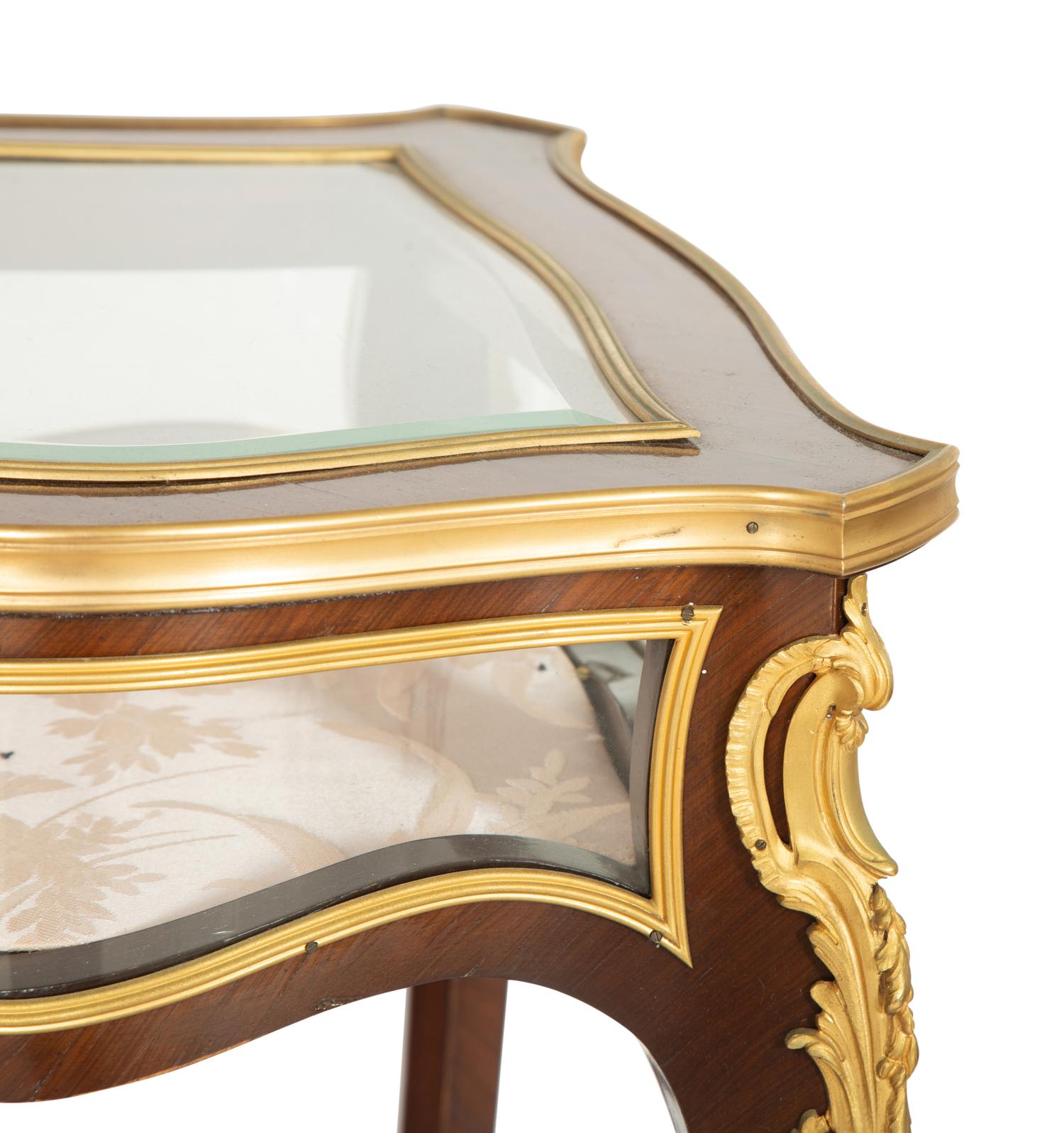A Louis XV Style Gilt Bronze Mounted Mahogany Vitrine Table
