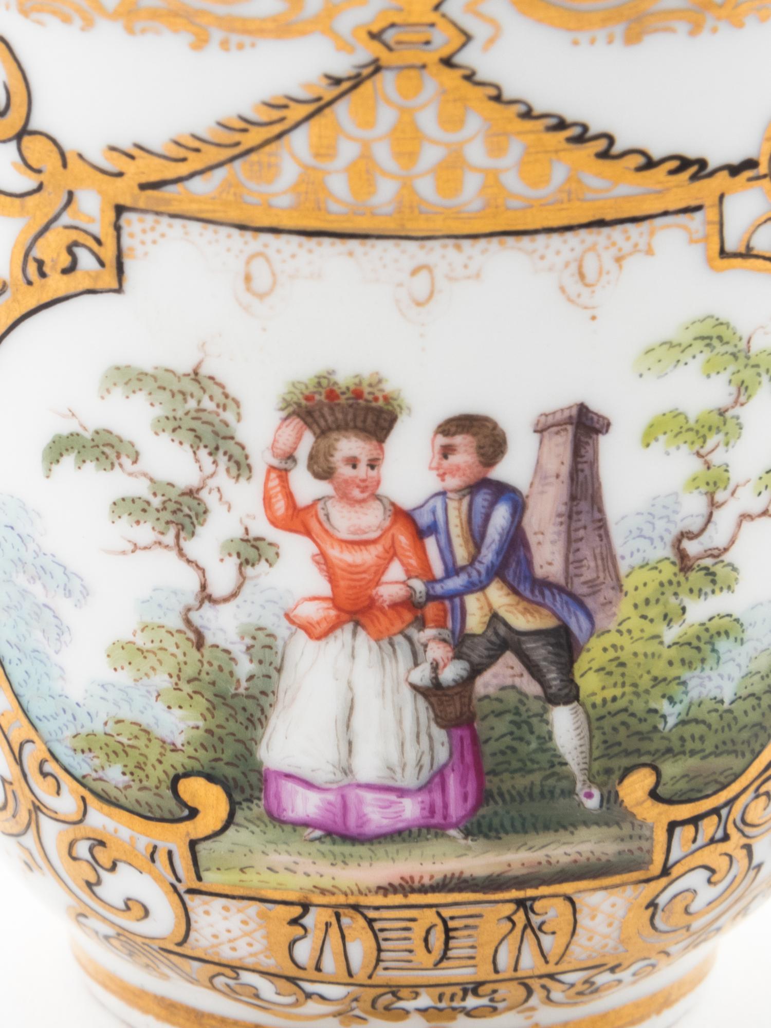 Three Meissen Painted and Parcel Gilt Porcelain Cup and Saucer Sets, a Covered Cup and Two Spoons