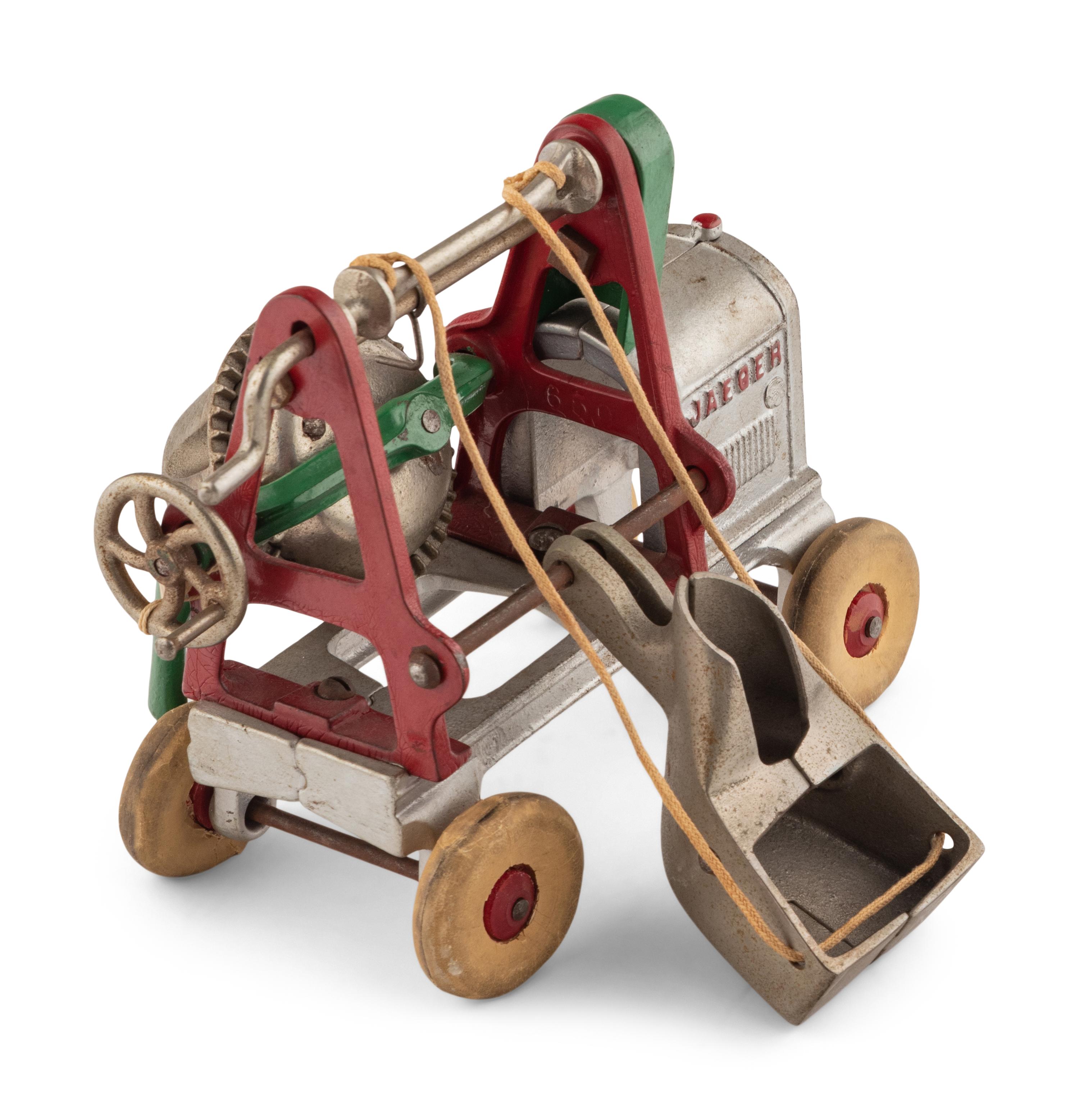 A Kenton Cast Iron Road Grader and Jaeger Cement Mixer