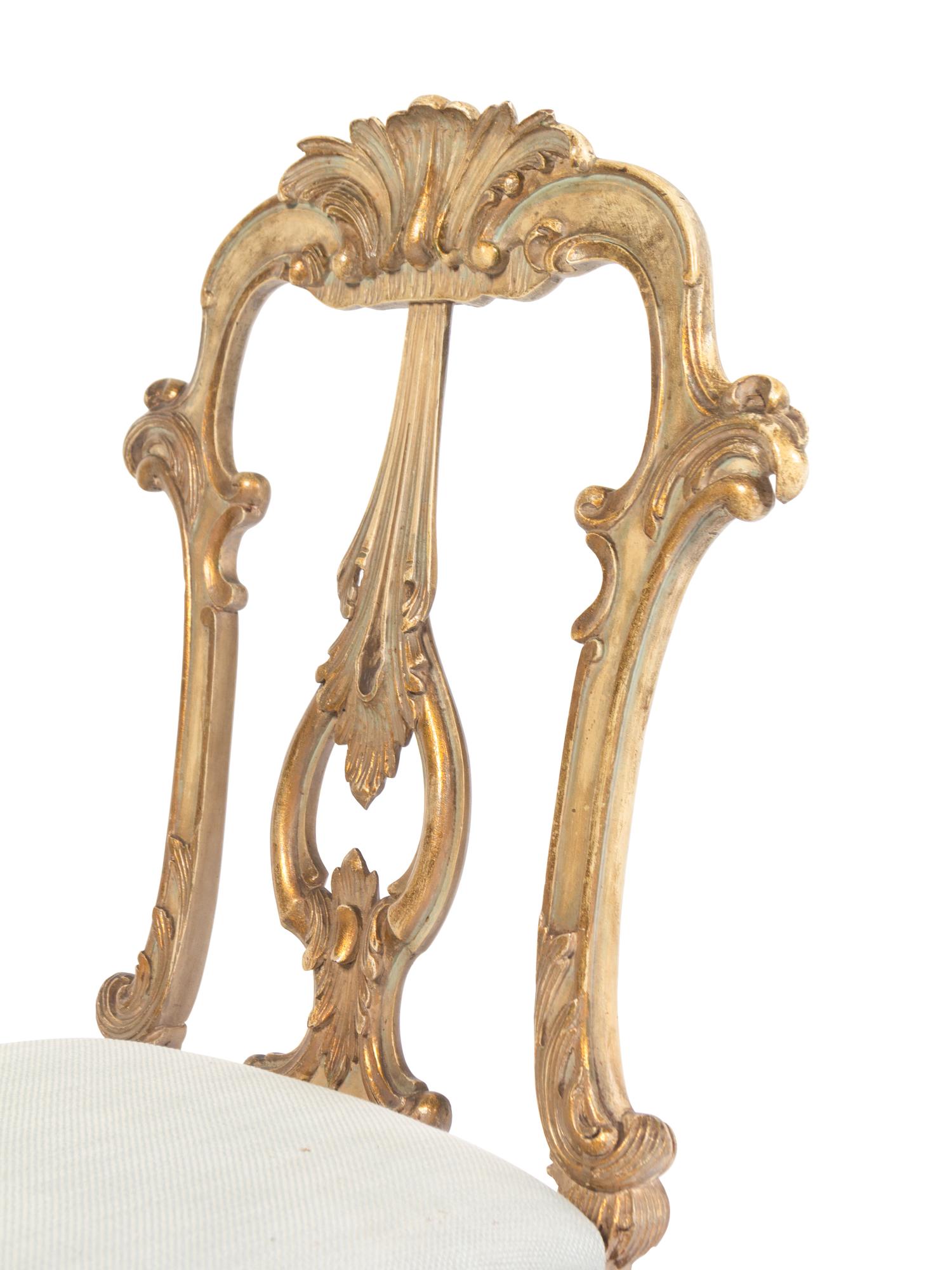 A Set of Six Venetian Style Painted and Parcel Gilt Dining Chairs