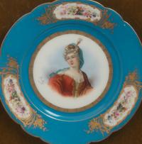 A Group of Seven Framed Sèvres Style Porcelain Plates