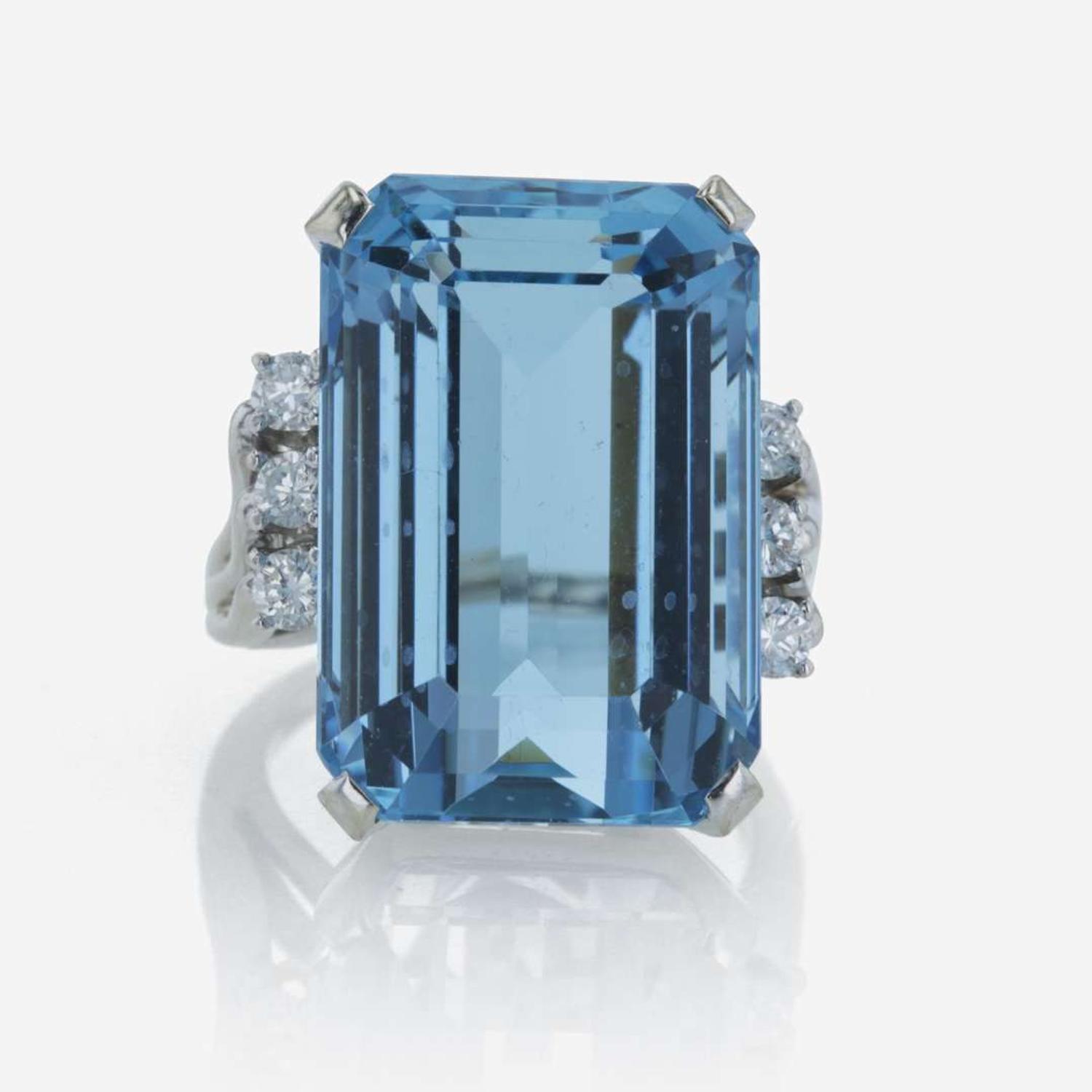 A 14K white gold, aquamarine, and diamond ring