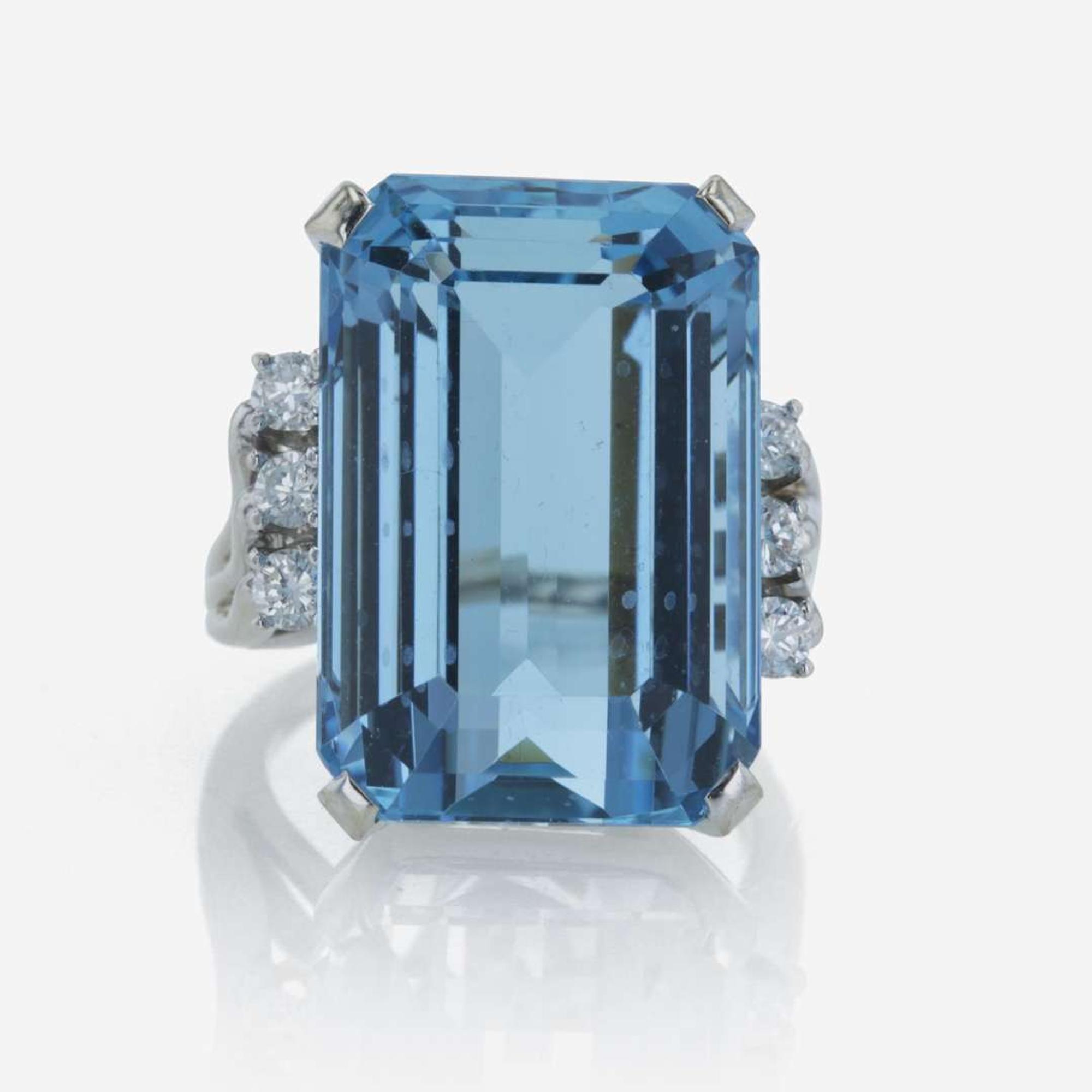 A 14K white gold, aquamarine, and diamond ring
