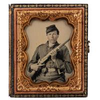 Ninth plate ambrotype of double-armed Ohio volunteer infantryman wearing "OVM" belt plate.