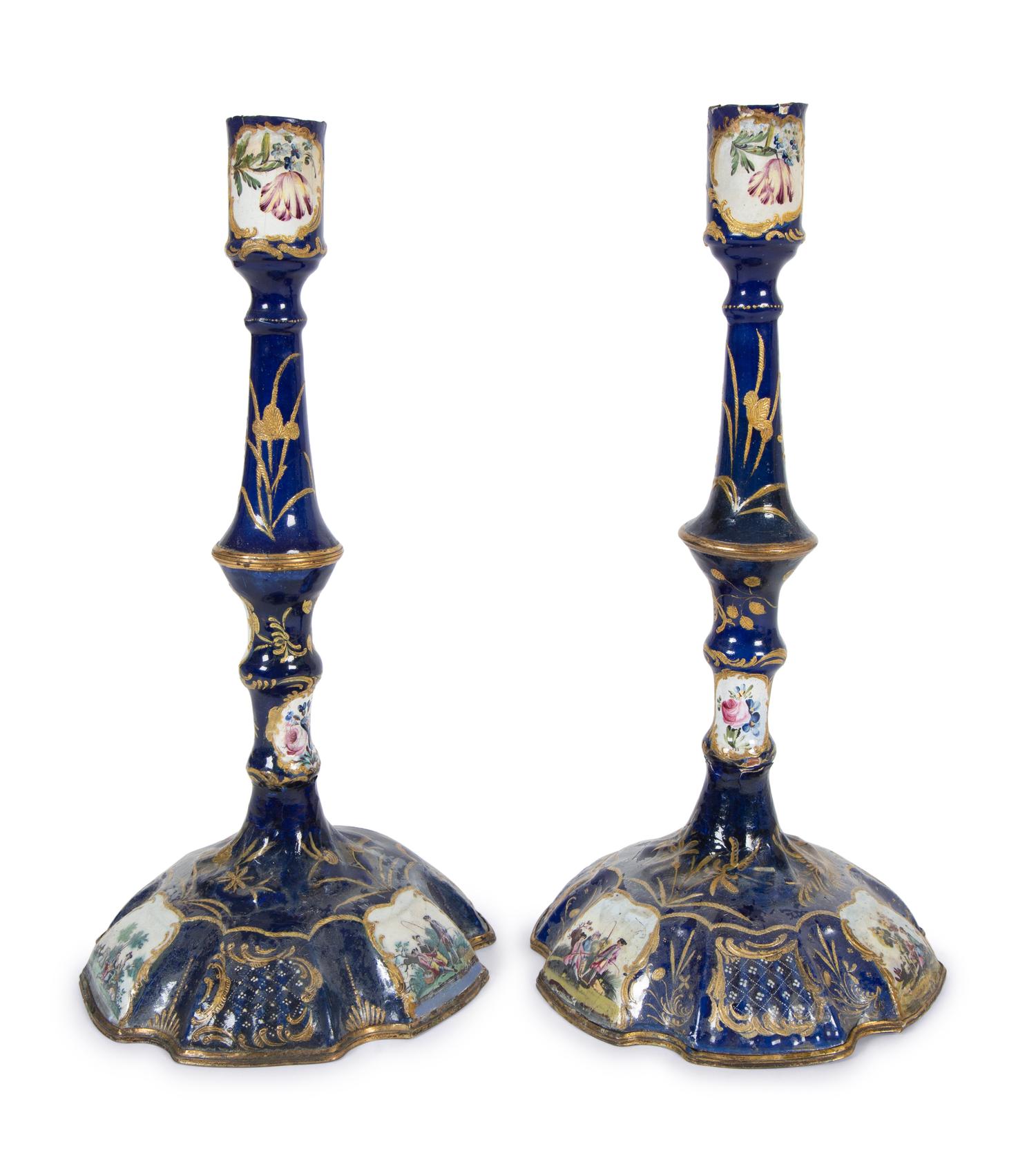A Pair of Battersea Enamel Candlesticks