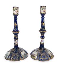 A Pair of Battersea Enamel Candlesticks