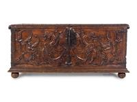 A Continental Carved Walnut Cassone