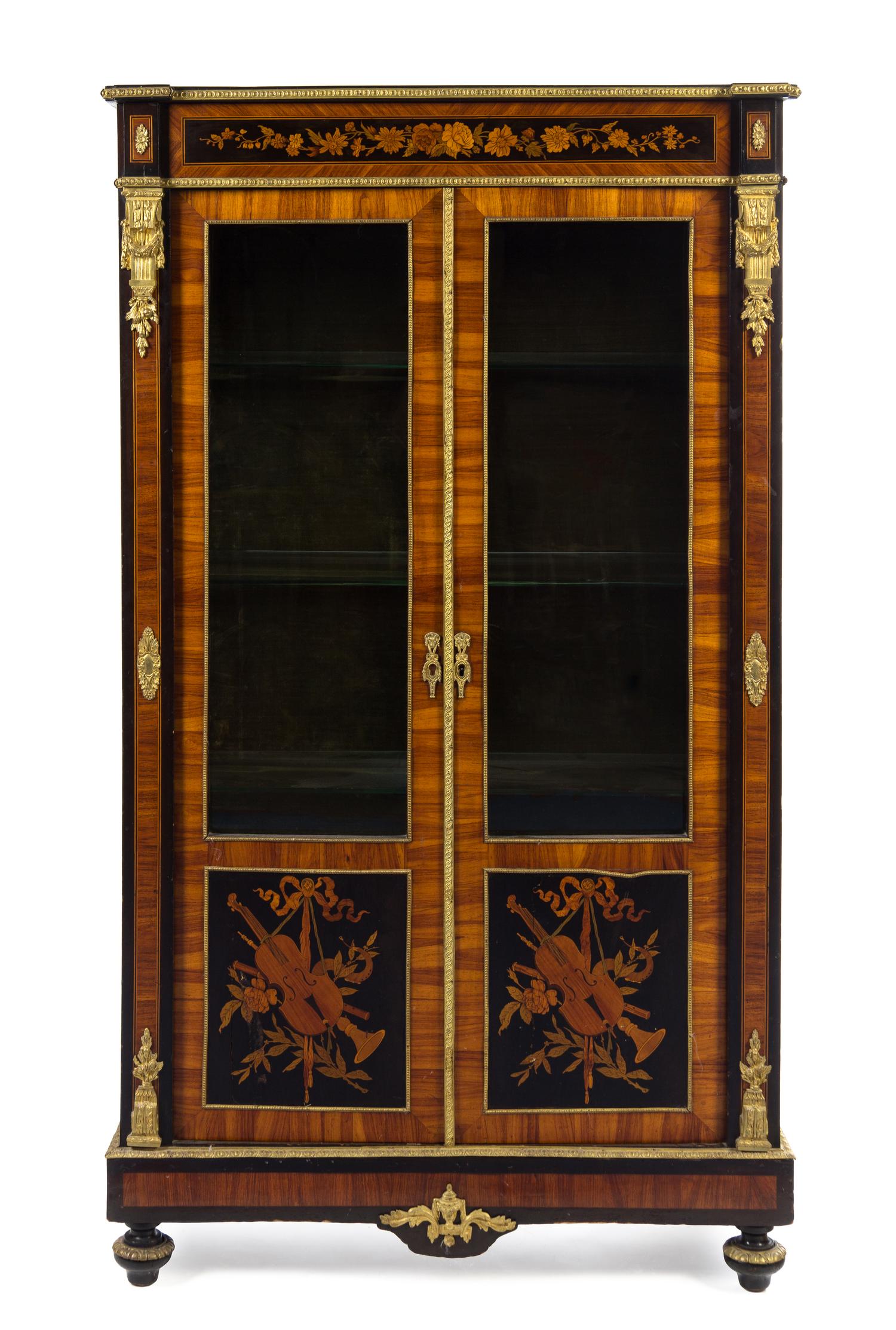 A Louis XVI Style Gilt Bronze Mounted Fruitwood and Marquetry Vitrine Cabinet Height 61 1/2 x width 35 x depth 13 1/4 inches. — 19TH CENTURY