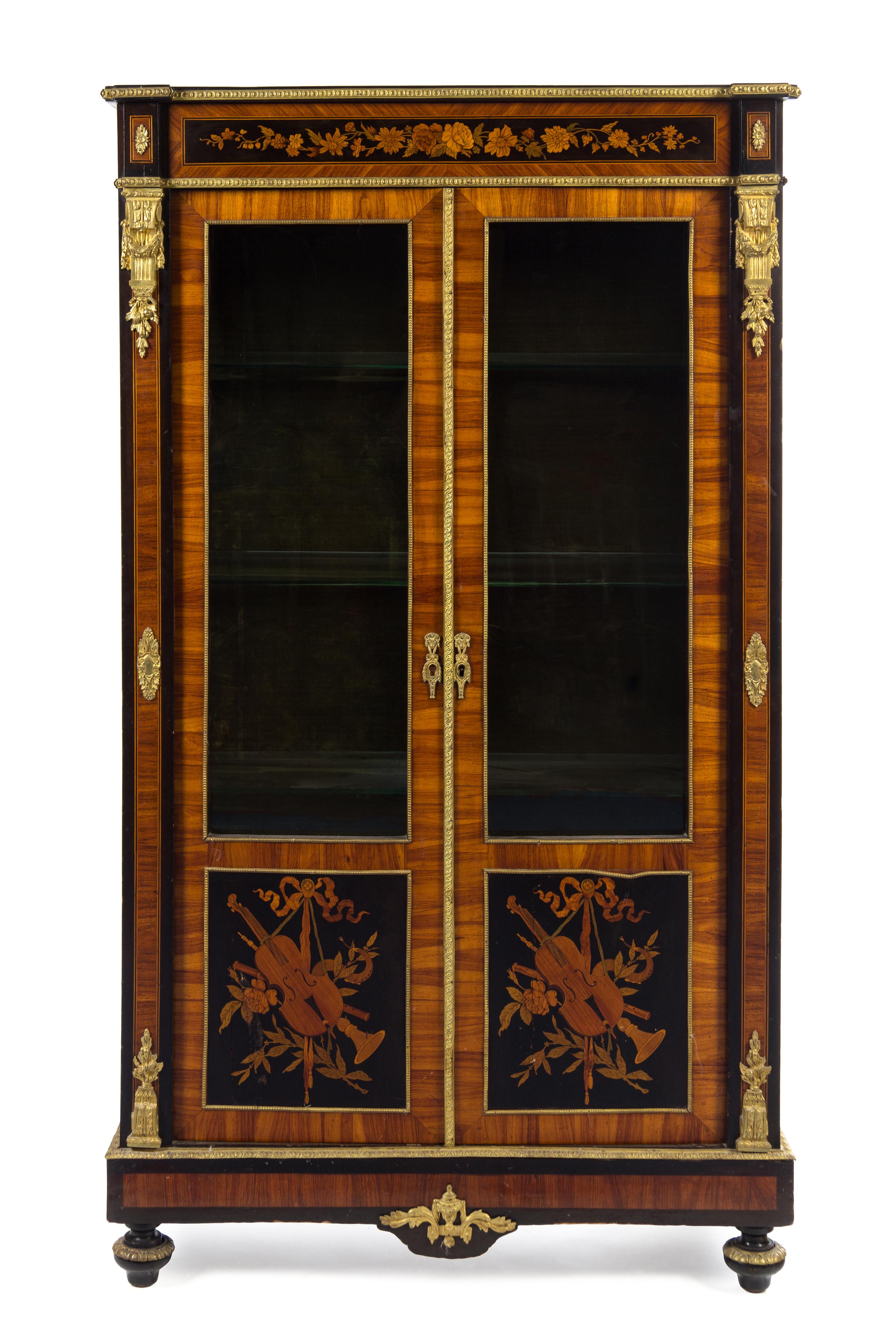 A Louis XVI Style Gilt Bronze Mounted Fruitwood and Marquetry Vitrine Cabinet Height 61 1/2 x width 35 x depth 13 1/4 inches. — 19TH CENTURY