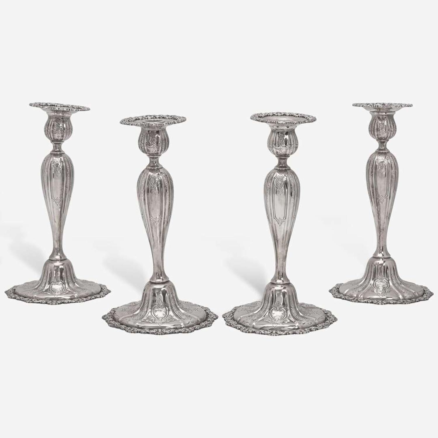 A set of four sterling silver candlesticks J.E. Caldwell & Co., Philadelphia, PA, early 20th century