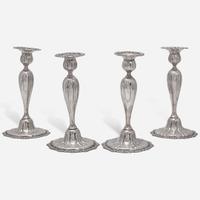 A set of four sterling silver candlesticks J.E. Caldwell & Co., Philadelphia, PA, early 20th century