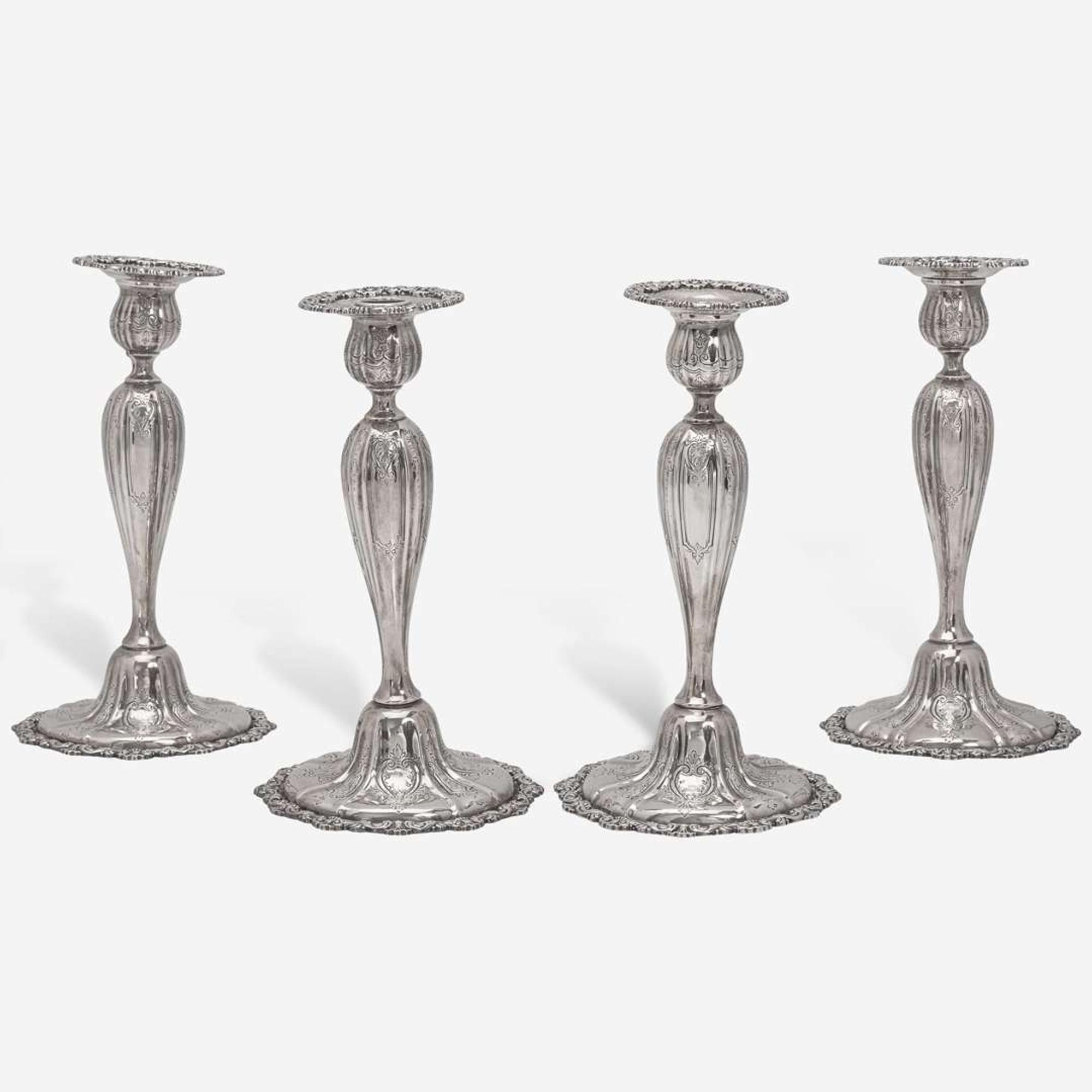 A set of four sterling silver candlesticks J.E. Caldwell & Co., Philadelphia, PA, early 20th century