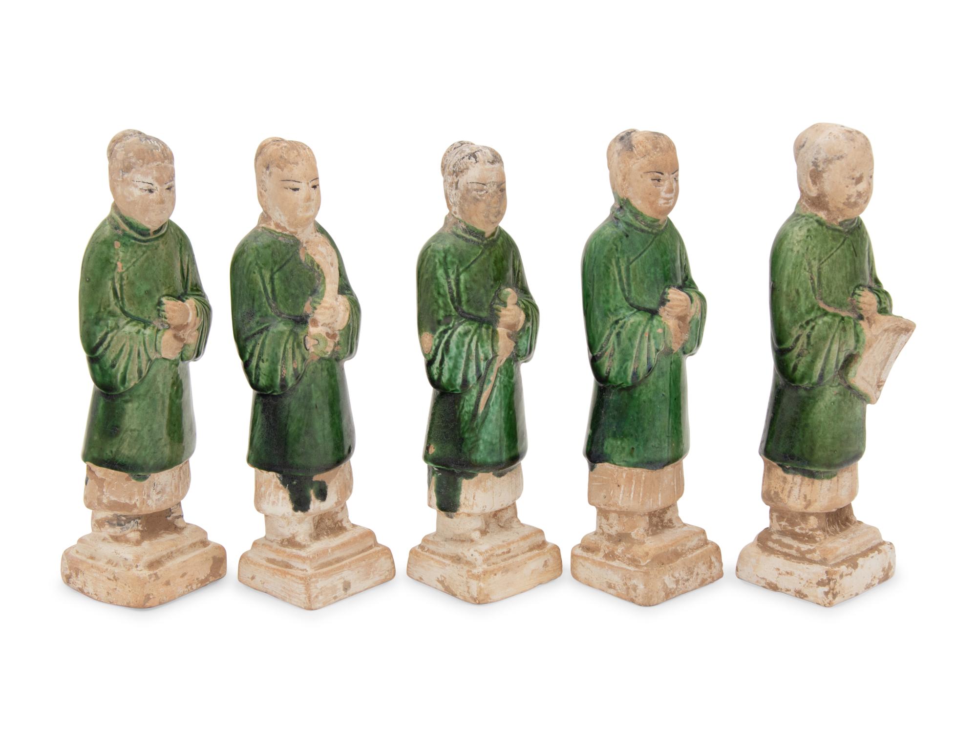 A Set of Five Chinese Green Glazed Porcelain Figures