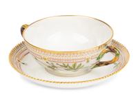 A Set of Twelve Royal Copenhagen Flora Danica Porcelain Bouillon Cups and Stands