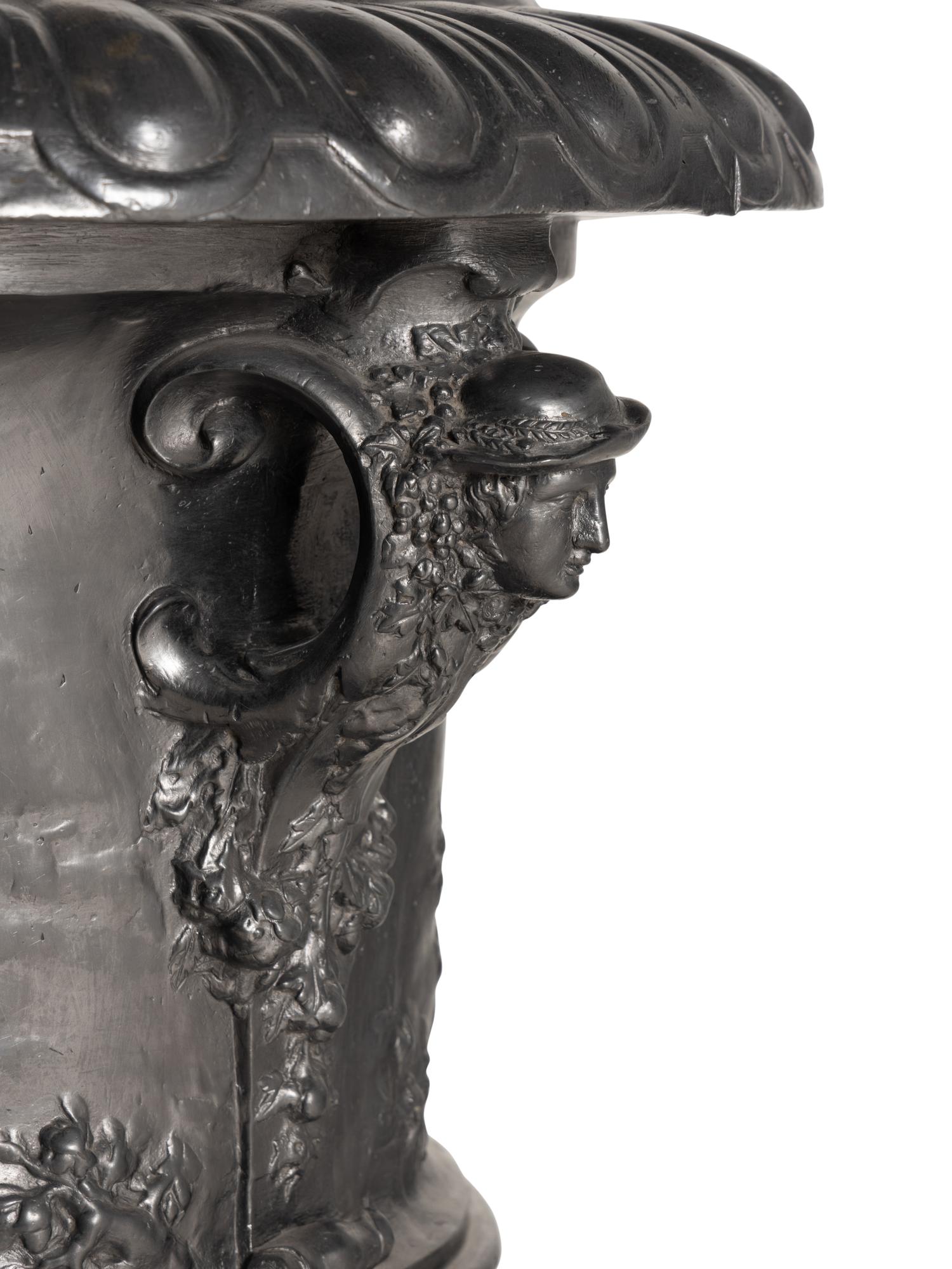 A Pair of English Lead Allegorical Garden Urns
