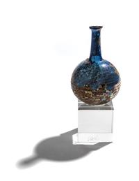 A Roman Blue Glass Bottle with Spiral Trail