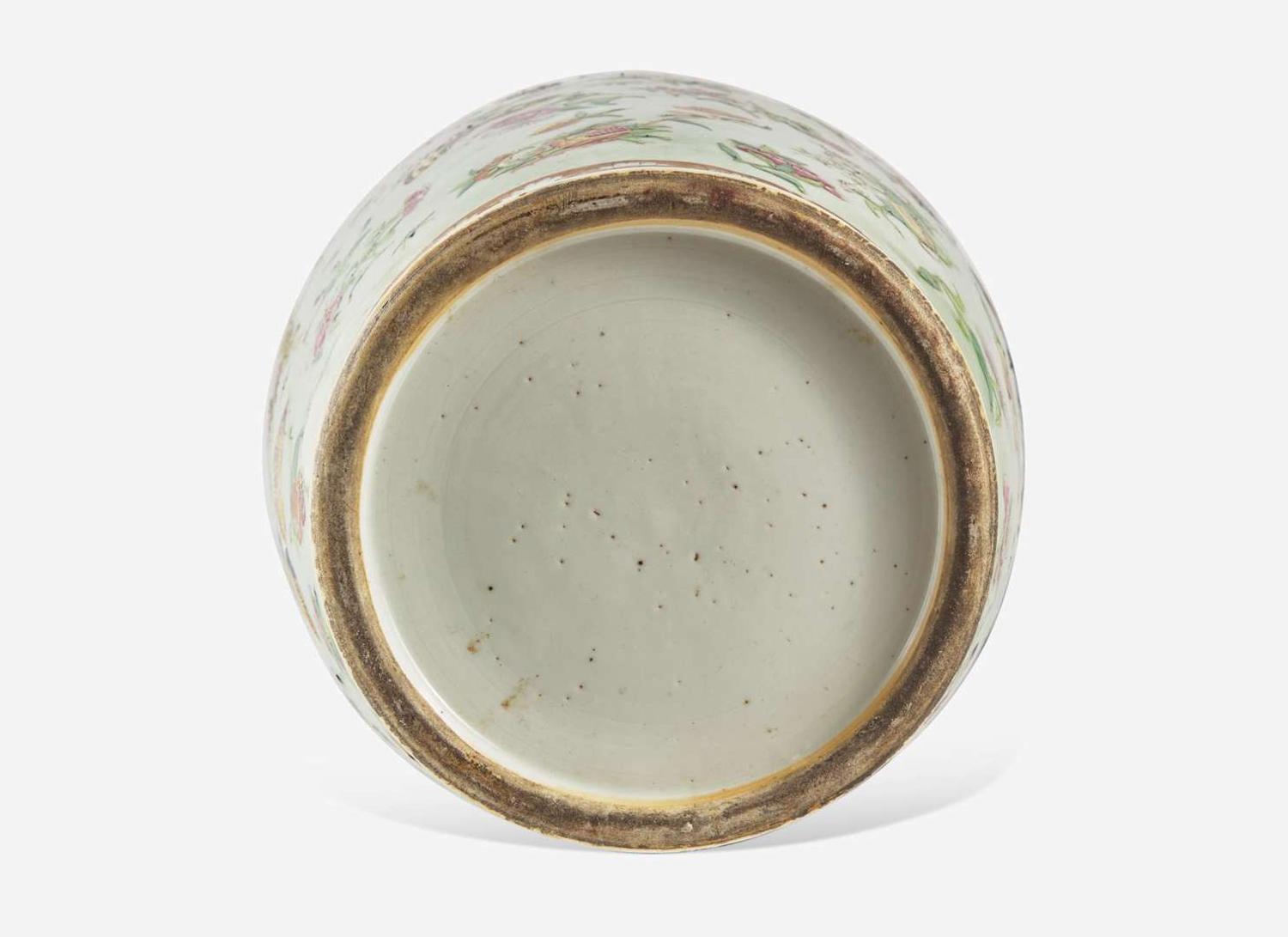 A Chinese famille-rose decorated molded celadon ground vase, 19th century 粉青地粉彩模印貫耳瓶 十九世紀