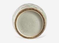A Chinese famille-rose decorated molded celadon ground vase, 19th century 粉青地粉彩模印貫耳瓶 十九世紀