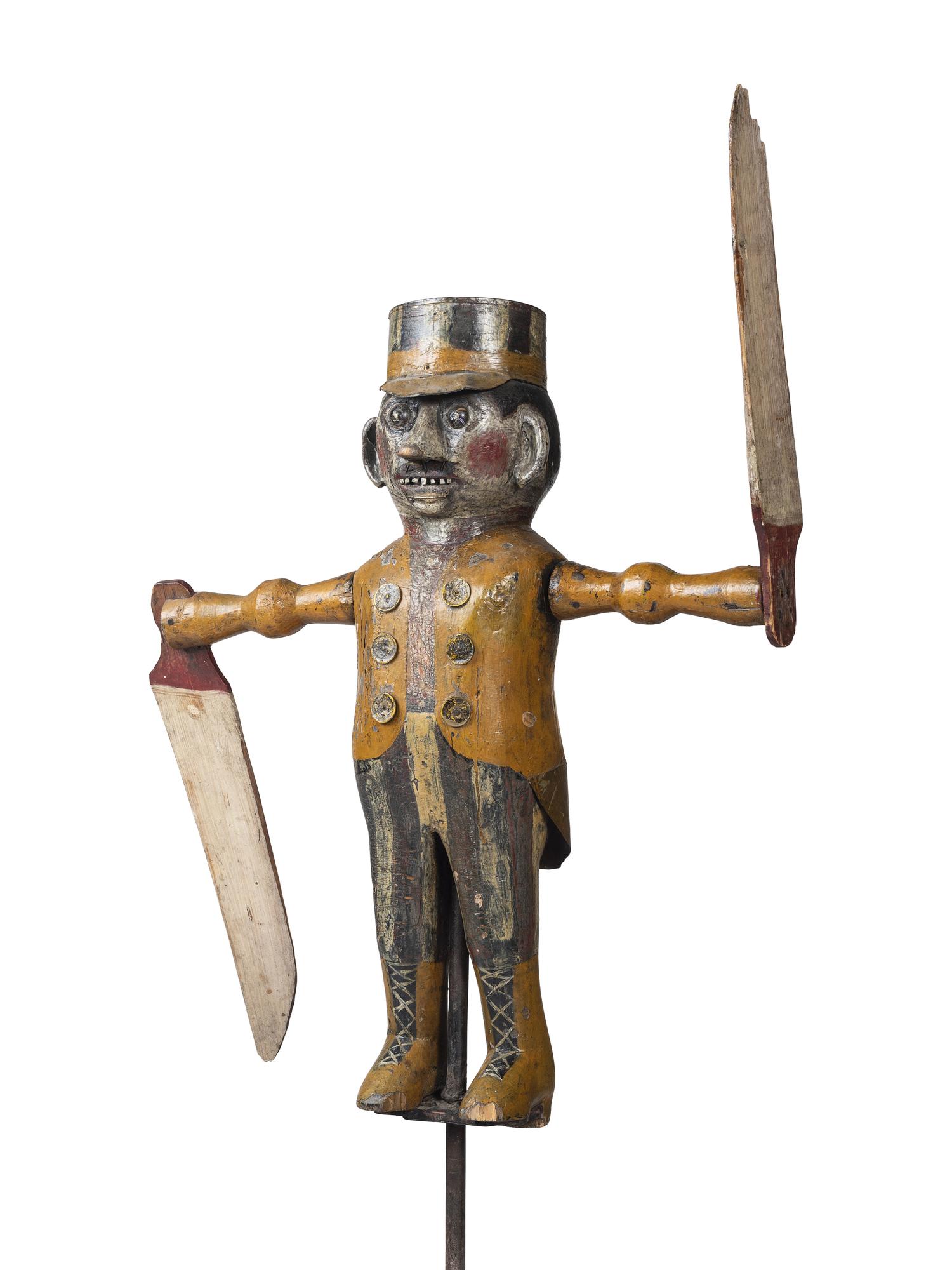 A Carved and Painted Wood and Sheet-Tin Circus Ringmaster Whirligig